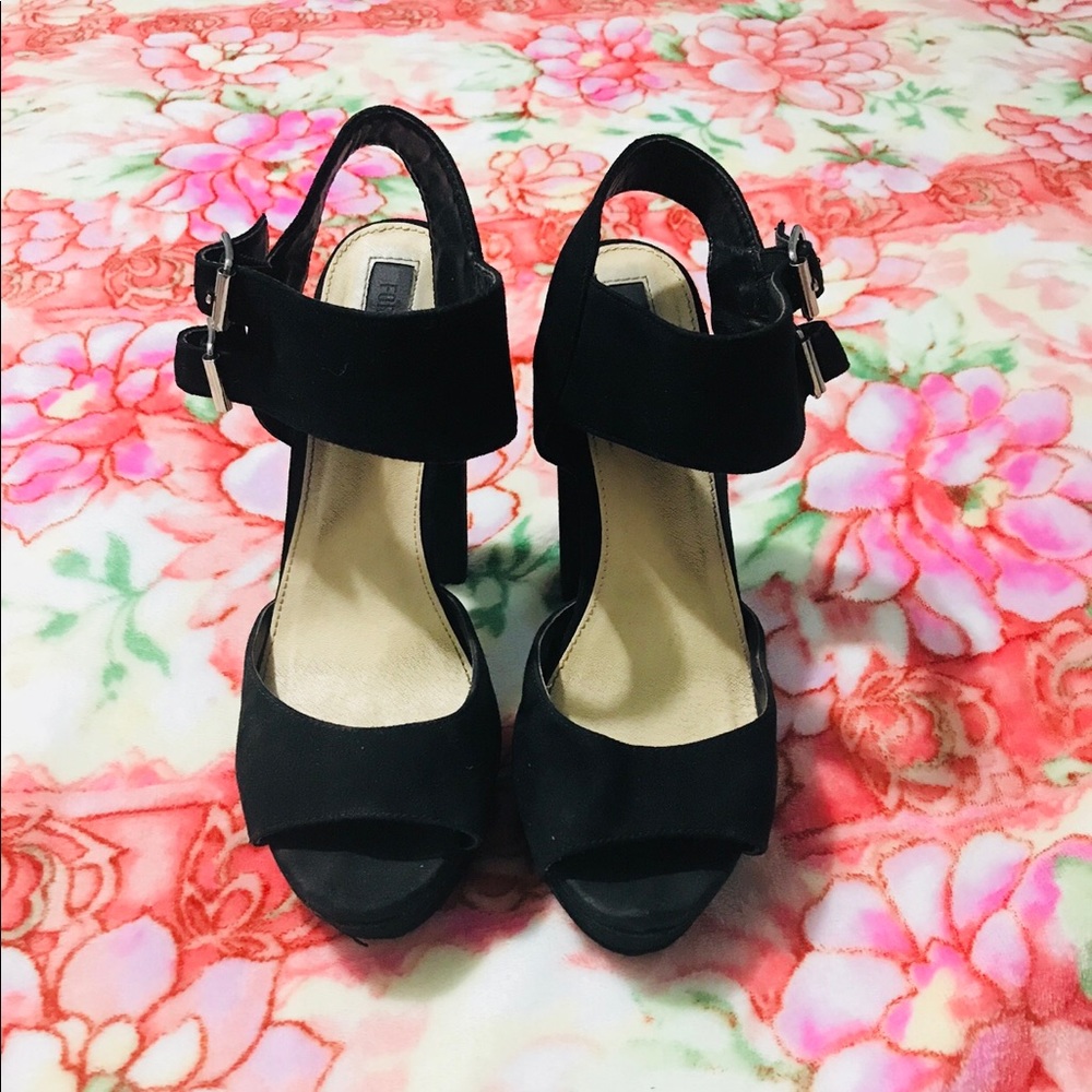 Double strap platform heels.